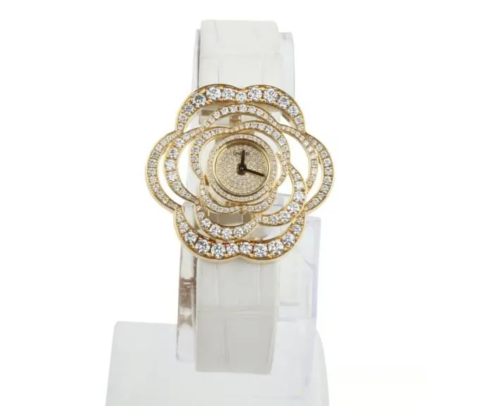 Chanel's Radiant Camélia: 18kt Yellow Gold & Diamond Timepiece"