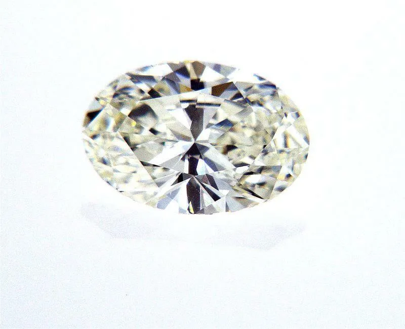 Guinness 0.79 Carat Oval Cut Natural Loose Diamond K VS1 GIA Certified