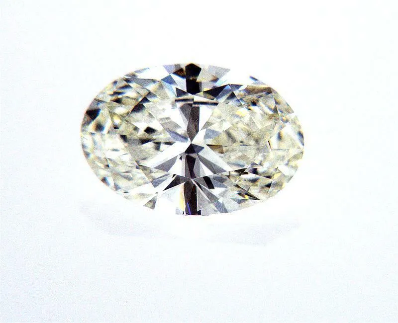 Guinness 0.79 Carat Oval Cut Natural Loose Diamond K VS1 GIA Certified
