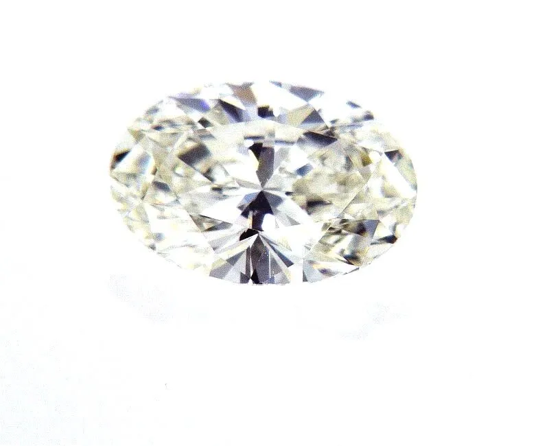 Guinness 0.79 Carat Oval Cut Natural Loose Diamond K VS1 GIA Certified
