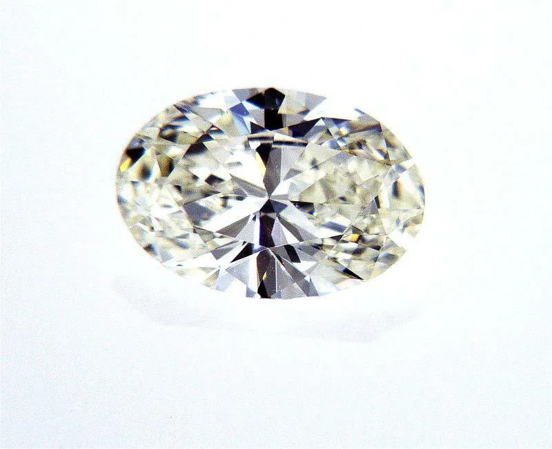 Guinness 0.79 Carat Oval Cut Natural Loose Diamond K VS1 GIA Certified