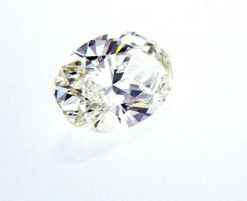 Guinness 0.79 Carat Oval Cut Natural Loose Diamond K VS1 GIA Certified